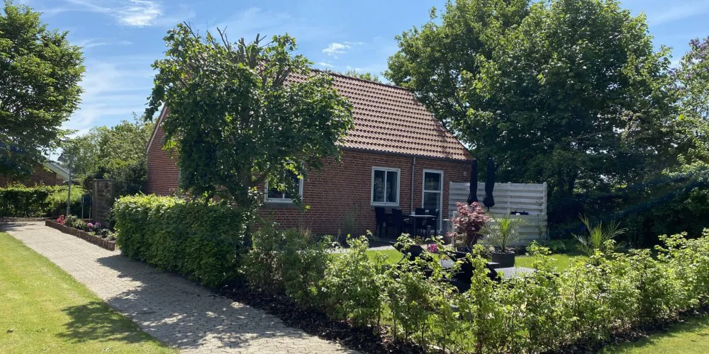 Hyggelige huse i grønne omgivelser